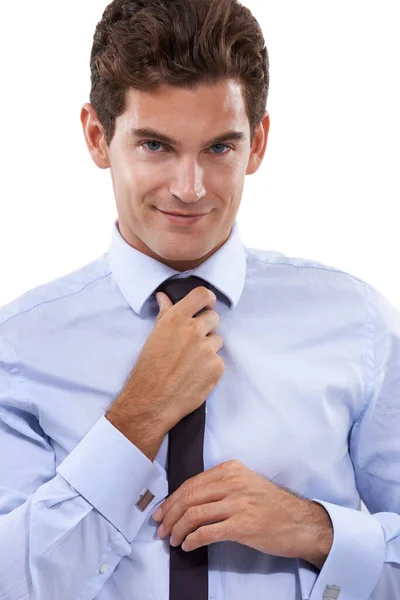 穿着成功的衣服 一个英俊的年轻商人正在调整领带 — 图库照片