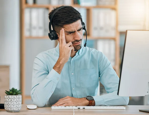 Stress, call center or man angry at computer, telemarketing agency and fail with headache, frustrated error or 404 glitch. Confused salesman at pc with challenge, client account problem or CRM crisis.