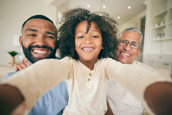 Selfie of dad, grandfather and boy child in home for love, profile picture and quality time together. Face portrait of young kid with photography of family generations, memory or smile on fathers day.