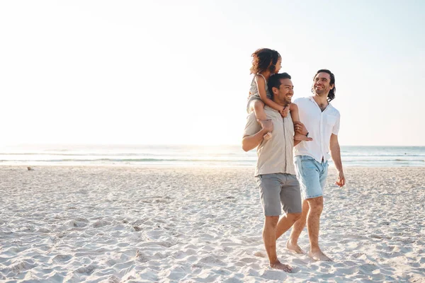 Gay couple, space and piggyback with family at beach for seaside holiday, support and travel mockup. Summer, vacation and love with men and child in nature for lgbtq, happiness and bonding together.