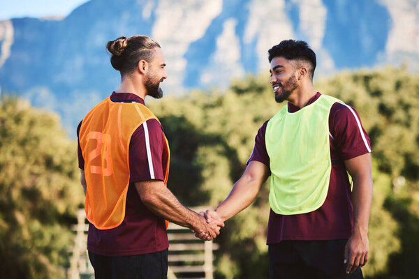 Handshake, rugby team and men in sports, exercise training or cooperation at field outdoor. Shaking hands, partnership and happy athlete people in agreement, intro and thank you, welcome or challenge.