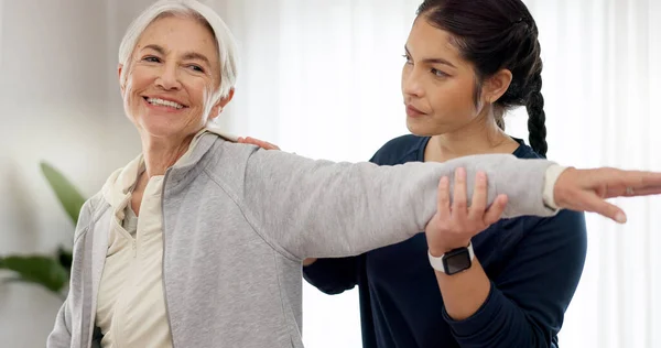 Physiotherapy, arm stretching and senior woman assessment, test or body exam for chiropractic rehabilitation. Physical therapy, chiropractor injury healing or physiotherapist helping elderly patient.