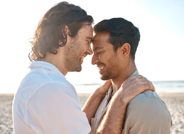 stock image Love, hug and gay men on beach, romance and smile on summer vacation together in Thailand. Sun, ocean and island, happy lgbt couple embrace in nature on fun tropical holiday with pride, sea and sand