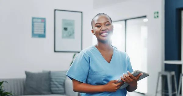 Happy woman or black doctor face in busy hospital with tablet for healthcare services, leadership and mindset. Portrait of medical professional or female nurse on telehealth app for clinic management.