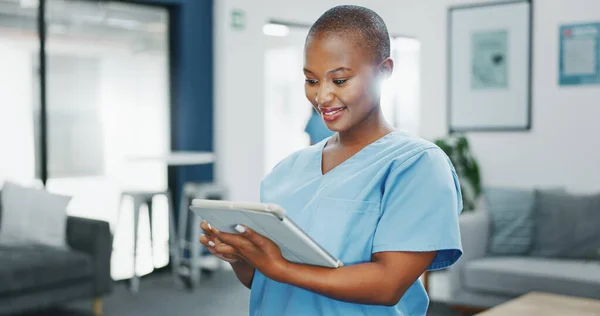 Happy woman or black doctor face in busy hospital with tablet for healthcare services, leadership and mindset. Portrait of medical professional or female nurse on telehealth app for clinic management.