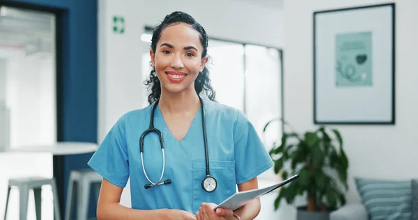 Proud face of woman doctor in busy hospital for healthcare services, leadership and happy career mindset. Confident portrait of young medical professional or female nurse in clinic or health care job.