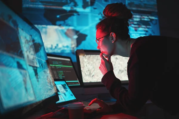 stock image Cybersecurity, woman and computer with global network for phishing, ransomware and cyber search. Maps, digital database and IT worker in dark room for virtual malware hacking fix of a employee back.