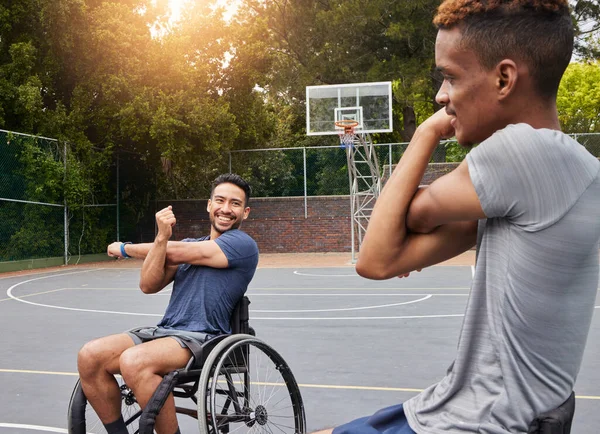 Stretching, wheelchair user and man on basketball court for training, challenge and competition. Fitness, health and teamwork with person with a disability warm up for sports workout, game and start.