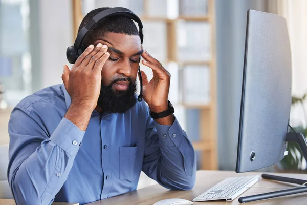 Business man, headache and call center stress, pain or communication mistake, error and sales crisis. Agent, consultant or african person on computer with brain fog, memory or telemarketing fail.