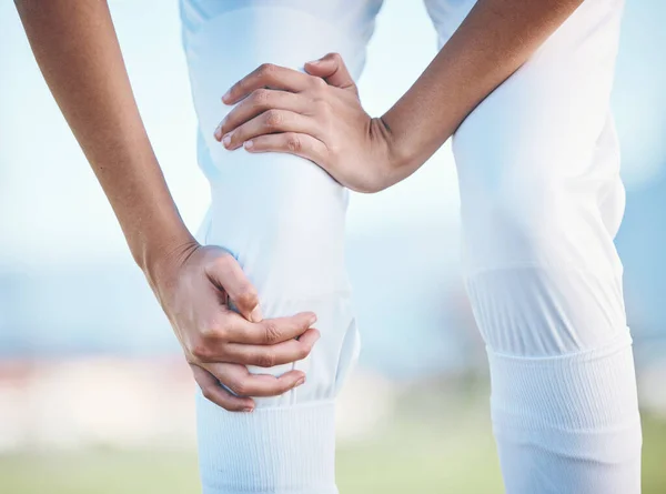 Injury, sports person or knee pain from running problem, baseball player mistake or fitness burnout risk. Bad joint, orthopedic or closeup athlete legs with match accident, strain or first aid crisis.