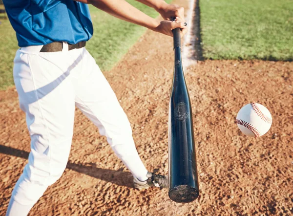 Baseball, bat and person hit a ball outdoor on a pitch for sports, performance and competition. Professional athlete or softball player for a game, training or exercise challenge at field or stadium.