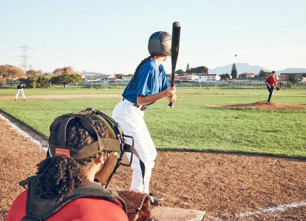Baseball player, bat and outdoor on a pitch for sports, performance and competition. Professional athlete or softball people ready for a game, training or exercise challenge at field or stadium.