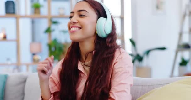 Headphones Dancing Young Woman Sofa Listening Music Playlist Album Living — Stock Video