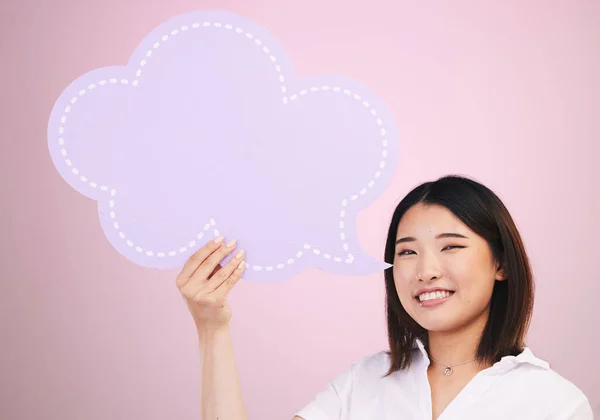 Woman, speech bubble and social media, portrait and voice with dialogue isolated on pink background. Smile, Asian and communication, chat and voice with feedback, FAQ and mockup space in a studio.