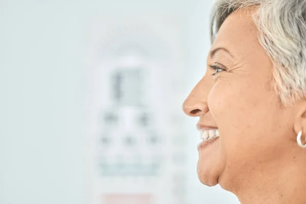 Side profile, face and mockup of a woman for optometry, vision test and exam for healthcare. Smile, medical and a mature person or customer at a clinic for service, wellness and space for eye care.