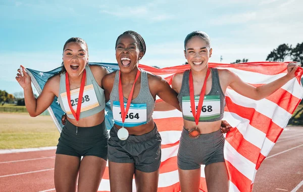 Athletics winner, portrait and sports women celebrate winning medal, competition award or event challenge. Success celebration, American flag and group of athlete excited for teamwork achievement.