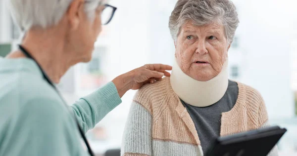 Doctor, tablet or patient in neck brace in consultation talking about results or planning rehabilitation in hospital. Advice, online or senior caregiver speaking to old woman with injury or accident.