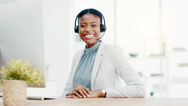 Black woman, call center and smile on computer in telemarketing, customer service or support. Portrait of happy African American female consultant agent with headset for help or advice at office desk.