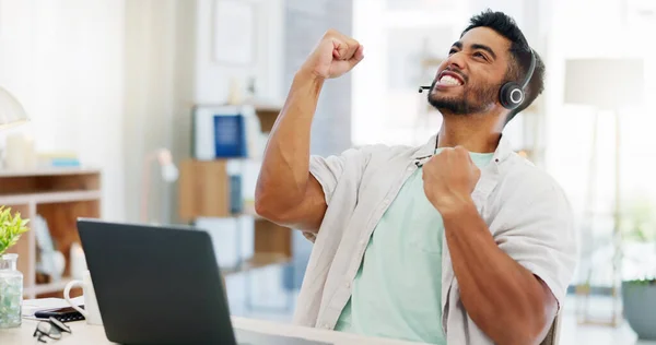 Success, win and call center worker with a laptop to celebrate a target, goal or bonus in remote work. Winning, excited and customer service agent cheering for good news, email and telemarketing.