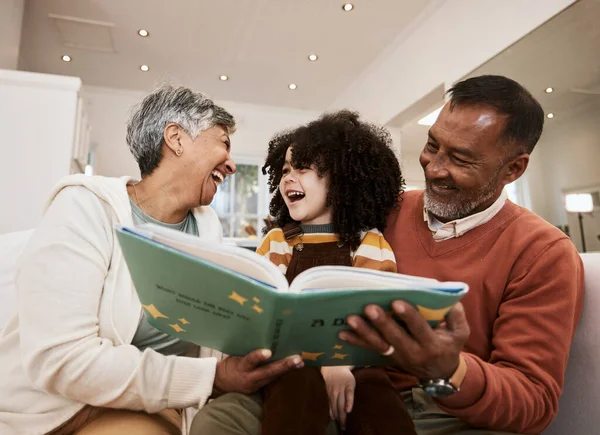 Grandparents, kid and laugh for reading, book or home for support, learning or education with love. Senior man, woman and happy child for funny story, teaching or help for development in family house.