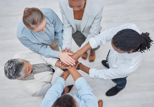 Hands stack, group circle and business people celebrate community cooperation, synergy or corporate meeting. Top view, project collaboration or staff partnership, solidarity and team building support.