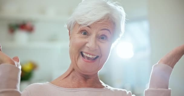 stock video Happy, laughing and face of senior woman at a home with sweet, cute and positive personality. Smile, excited and portrait of elderly female person in retirement listening to funny comic joke at house.