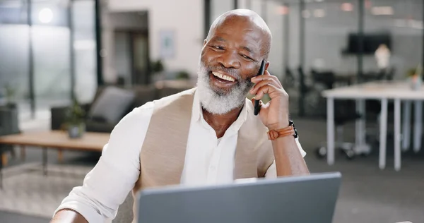 Black man, phone call or happy senior businessman in office for networking, good news or deal negotiation. Smile, laptop or mature CEO on mobile communication or discussion for online sales project.