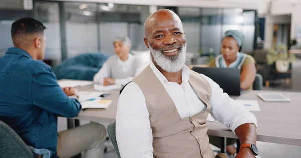Leadership, meeting and portrait of mature black man in office with corporate business people. Strategy, planning and collaboration, smile of businessman in conference room for professional workshop