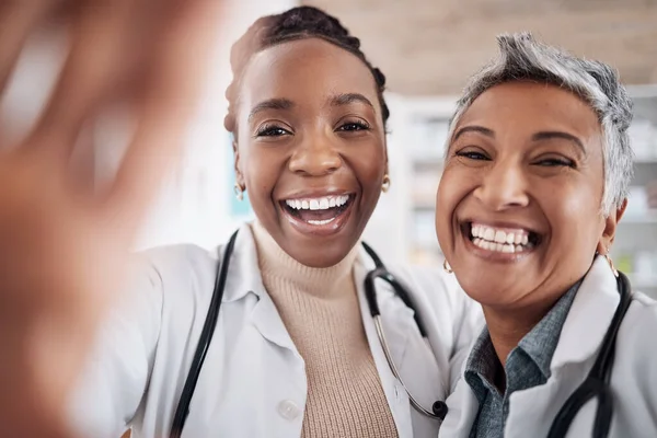 Happy, portrait or doctors in a selfie for a social media profile picture of a healthcare team of friends in hospital. Women or faces of medical worker taking picture or photo for memory with smile.