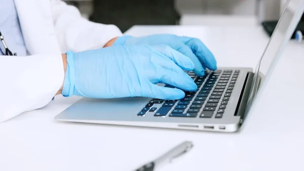 Hands Scientist Surgical Gloves Typing Laptop Medical Lab Closeup Healthcare — Zdjęcie stockowe