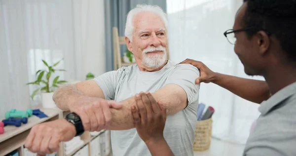 Physiotherapy results, arm stretching or old man for rehabilitation, recovery and black man check injury healing. Support, motion mobility assessment or African physiotherapist advice elderly patient.