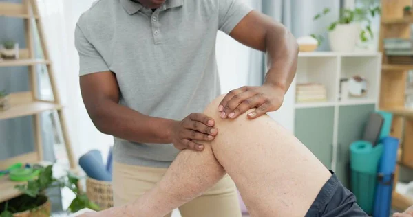 Physiotherapy hands, knee massage and person help patient with rehabilitation, recovery or joint problem. Physical therapy care, injury healing support and physiotherapist check leg muscle of client.
