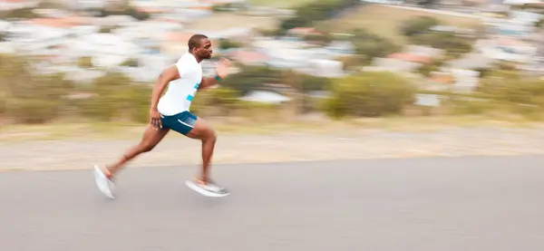 Fast, road and a black man running for cardio, exercise and training for a marathon. Sports, health and an African runner or person in the street for a workout, fitness or athlete commitment.