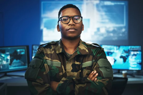 Military, surveillance and portrait of man with arms crossed in security, control room and monitor government, operation or mission. Army, employee and face with pride, confidence and working in tech.