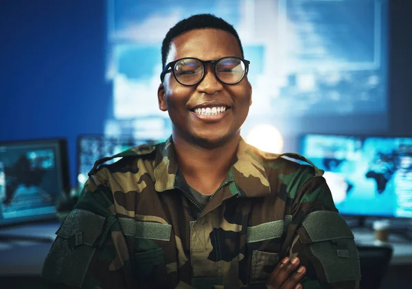 Military, surveillance and happy portrait of man with arms crossed in cybersecurity, control room and government mission. Army, employee and face in smile with pride, confidence and working in tech.