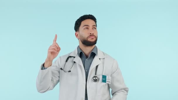 Docteur Homme Pointant Vers Haut Pour Présentation Des Soins Santé — Video
