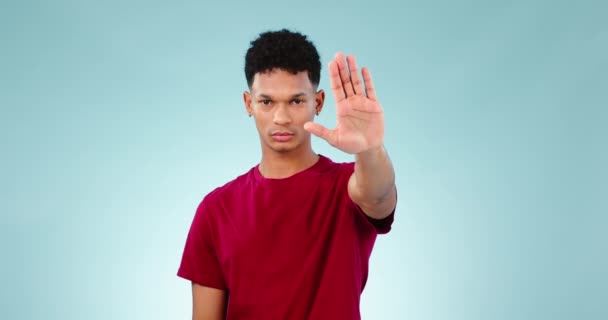 Hand Stop Warning Serious Man Blue Background Studio Gesture Rejection — Stok Video