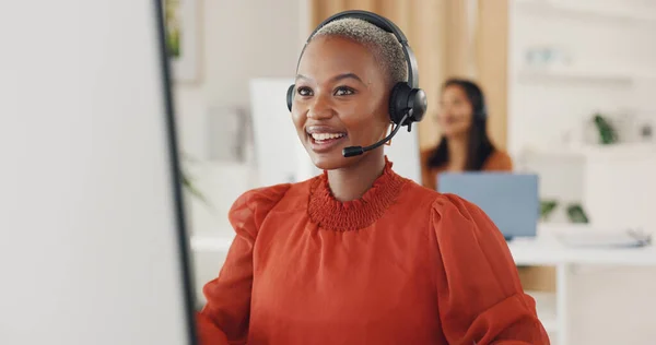 Call center, black woman and consulting at computer in office for CRM questions, FAQ contact and IT support. Happy telemarketing agent at desktop for sales advisory, telecom solution and offer help.