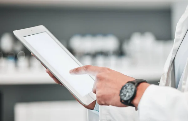 Tablet, pharmacy and hands of person with mockup space for advertising, wellness app and telehealth. Healthcare, pharmaceutical and worker on digital tech for medical service, medicine and research.