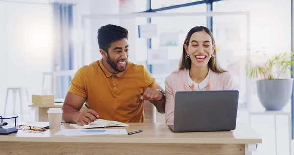Creative business people, laptop and high five for winning, success or planning together in teamwork at office. Happy man and woman touching hands on touchscreen for team collaboration or achievement.