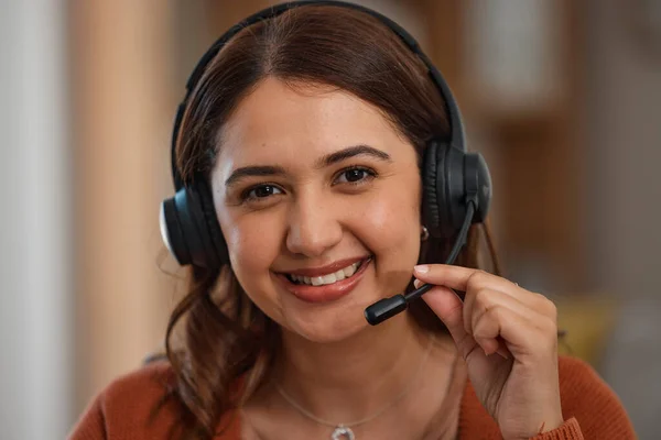 Portrait, smile and home call center with a woman at work for customer service or consulting. Smile, communication and headset with a happy young freelance employee closeup for remote work or support.