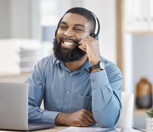 Call center, laptop and man, consultant or business agent for information technology, software support or helping. Communication, IT worker or african person in portrait for virtual online consulting.