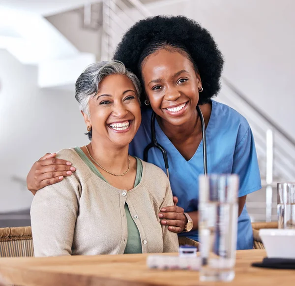 Portrait, smile and assisted living caregiver with an old woman in the living room of a home together. Healthcare, support or community with a happy nurse or volunteer and senior patient in a house.