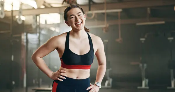 Gym, face and happy woman with positive attitude, mindset and laughing after training routine. Portrait, smile and lady athlete at sports center confident, ready and enjoy fitness or health lifestyle.