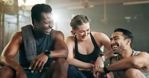 Fitness, group and laughing in gym with confidence, workout and exercise class. Diversity, friends and wellness portrait of funny athlete with community ready for training and sport at a health club.