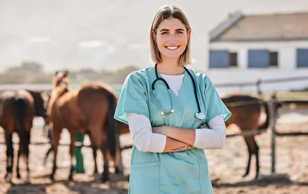 Happy horse vet, portrait and woman with arms crossed, care or smile for love, animal or nature at farm. Doctor, nurse and equine healthcare expert in sunshine, countryside and services for wellness.