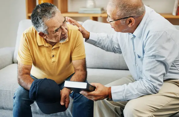 Men, home and bible with support for faith, worship and prayer by pastor, church or jesus christ. Elderly men, diversity and spiritual guidance for grief with loss and depression with hope in god.