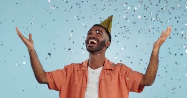 Man Birthday Party Hat Confetti Studio Smile Surprise Celebration Blue — Stock Video