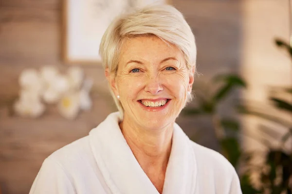 Happy, portrait and senior woman at spa for health, wellness and anti aging skincare treatment. Calm, beauty and elderly female person at retirement resort for wrinkles face routine at natural salon