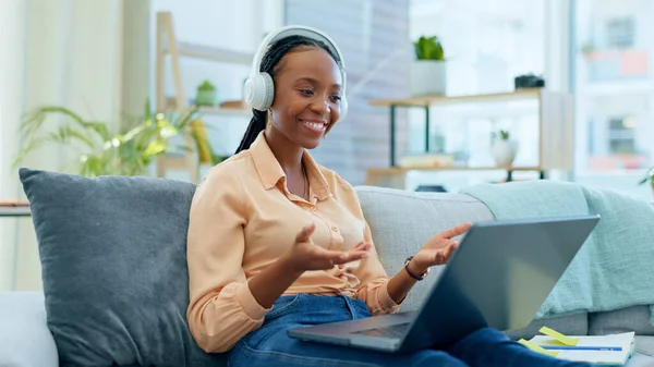 Black woman, laptop or video call on house sofa for networking, b2b customer deal or freelance business consulting. Smile, happy or talking employee on remote work technology or mobile communication.